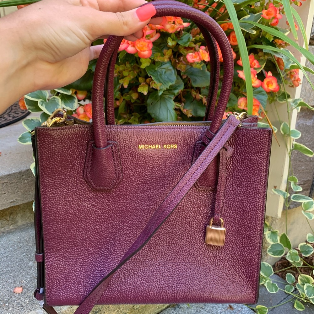Michael Kors Magenta crossbody and hand bag